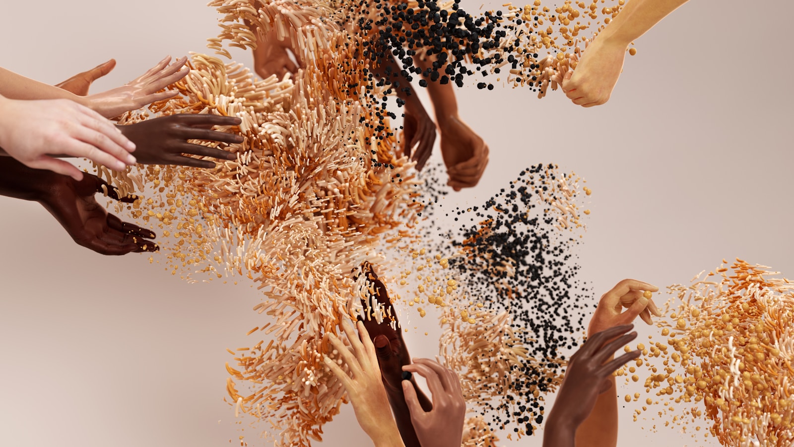 a group of hands reaching up into a pile of food